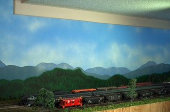 I elected to make the double ended staging yard (Cumberland, MD on the east end and Parkersburg, WV on the west end visible complete with scenery.  I just couldn’t bring myself to hide these beautiful trains