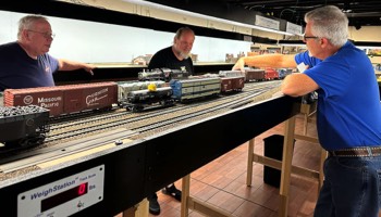  Rob Biddison working Middle Yard with his patented 0-5-0 switching procedure, whilst Bill Hirt and John Vandenberg look on