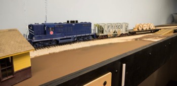  An extra is spotting a load of cable at the Weingarten house track